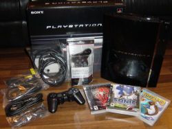 Sony Playstation 3 6GB console with three games and extras