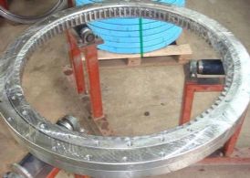 Double four point ball with internal gear