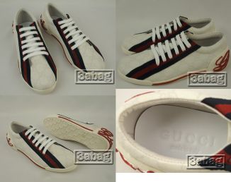 GUCCI white GG embossed lace-up sneaker 168038